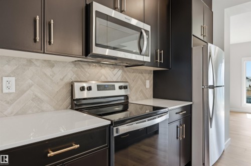 #4 11910 35 Av Sw, Edmonton, AB - Indoor Photo Showing Kitchen
