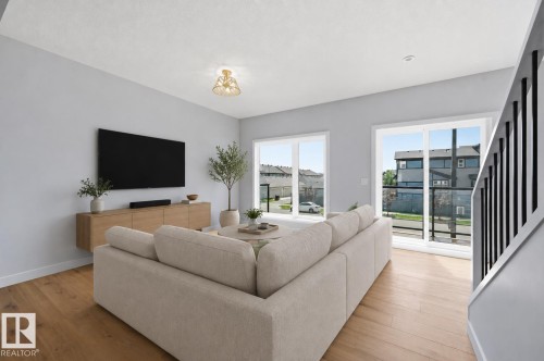 Virtually staged - #4 11910 35 Av Sw, Edmonton, AB - Indoor Photo Showing Living Room