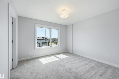 #4 11910 35 Av Sw, Edmonton, AB - Indoor Photo Showing Other Room