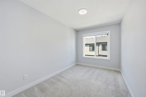 #4 11910 35 Av Sw, Edmonton, AB - Indoor Photo Showing Other Room