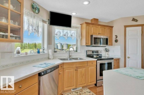 51111 Rr 233, Rural Strathcona County, AB - Indoor Photo Showing Kitchen With Double Sink