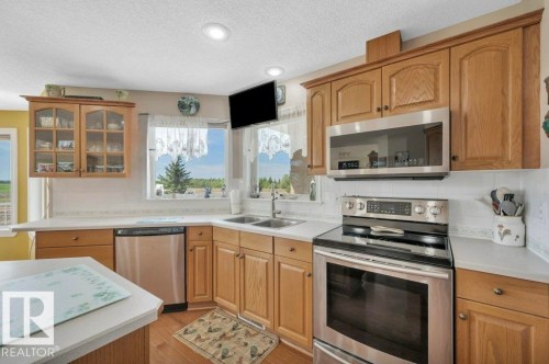 51111 Rr 233, Rural Strathcona County, AB - Indoor Photo Showing Kitchen With Double Sink