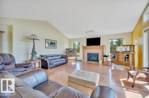 51111 Rr 233, Rural Strathcona County, AB - Indoor Photo Showing Living Room With Fireplace