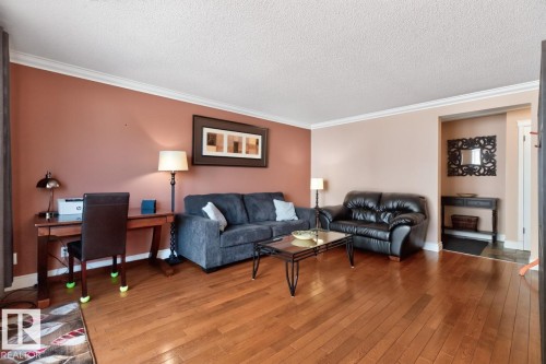 #206 10745 83 Av Nw, Edmonton, AB - Indoor Photo Showing Living Room