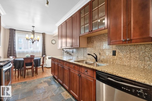 #206 10745 83 Av Nw, Edmonton, AB - Indoor Photo Showing Kitchen With Double Sink