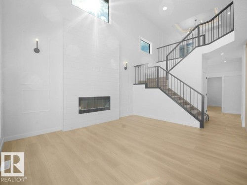 3327 Chernowski Way, Edmonton, AB - Indoor Photo Showing Other Room With Fireplace