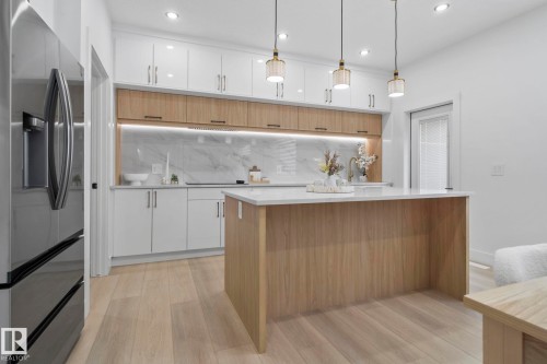 88 Silverstone Drive, Stony Plain, AB - Indoor Photo Showing Kitchen With Upgraded Kitchen