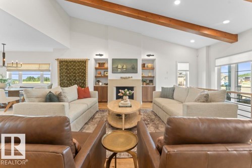 Vaulted ceiling with exposed wood beams - 2503 Lockhart Way, Cold Lake, AB - Indoor Photo Showing Living Room