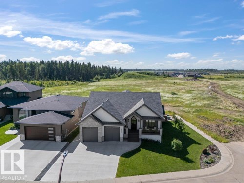 Modern craftsman-style exterior featuring stone and siding finishes - 2503 Lockhart Way, Cold Lake, AB - Outdoor With Facade