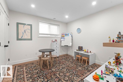 Bright room with recessed lighting, light wood-finish flooring, white baseboards, and a window with a roller shade - 2503 Lockhart Way, Cold Lake, AB - Indoor