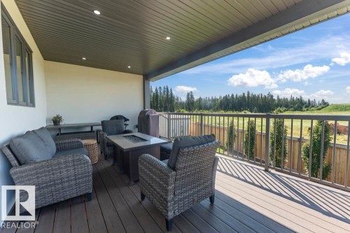 Covered outdoor patio featuring a composite deck and recessed lighting - 2503 Lockhart Way, Cold Lake, AB - Outdoor With Deck Patio Veranda With Exterior