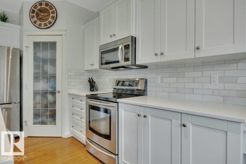 313 Southwick Boulevard, Leduc, AB - Indoor Photo Showing Kitchen With Stainless Steel Kitchen