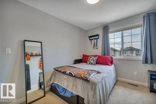 313 Southwick Boulevard, Leduc, AB - Indoor Photo Showing Bedroom