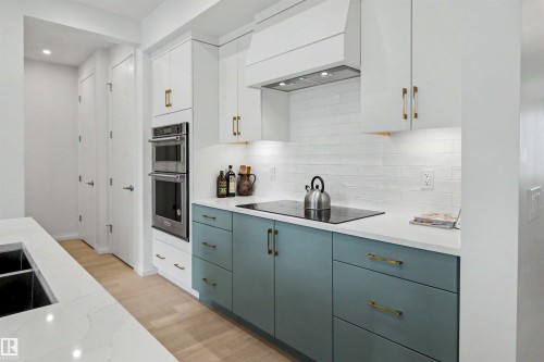 155 Stonehouse Way, Leduc, AB - Indoor Photo Showing Kitchen With Upgraded Kitchen