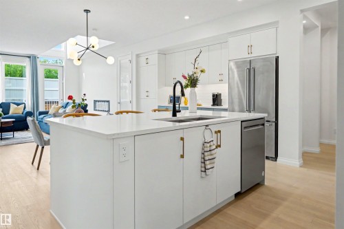 155 Stonehouse Way, Leduc, AB - Indoor Photo Showing Kitchen With Double Sink With Upgraded Kitchen