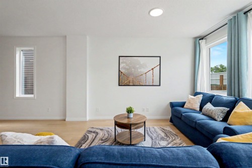 155 Stonehouse Way, Leduc, AB - Indoor Photo Showing Living Room