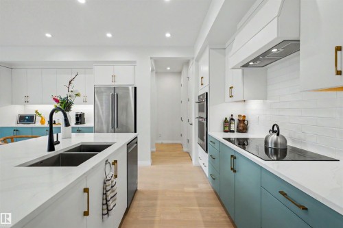 155 Stonehouse Way, Leduc, AB - Indoor Photo Showing Kitchen With Double Sink With Upgraded Kitchen