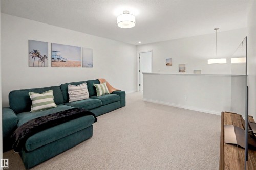 155 Stonehouse Way, Leduc, AB - Indoor Photo Showing Living Room