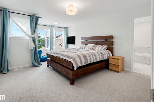 155 Stonehouse Way, Leduc, AB - Indoor Photo Showing Bedroom