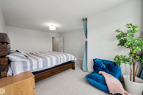 155 Stonehouse Way, Leduc, AB - Indoor Photo Showing Bedroom