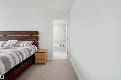 155 Stonehouse Way, Leduc, AB - Indoor Photo Showing Bedroom