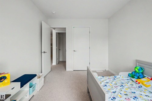 155 Stonehouse Way, Leduc, AB - Indoor Photo Showing Bedroom