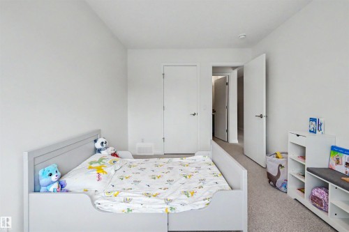 155 Stonehouse Way, Leduc, AB - Indoor Photo Showing Bedroom
