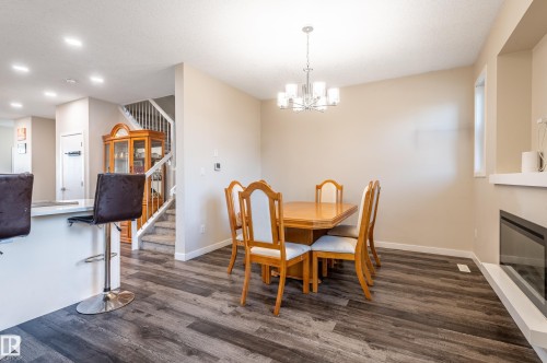 15928 100 Avenue Nw, Edmonton, AB - Indoor Photo Showing Dining Room With Fireplace
