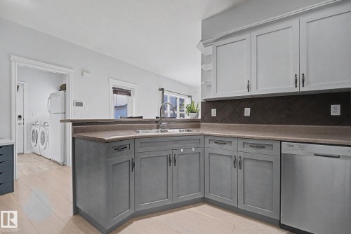 5079 Thibault Way Nw, Edmonton, AB - Indoor Photo Showing Kitchen With Double Sink