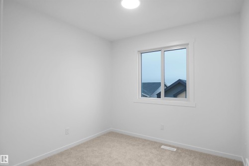 #9 1430 Aster Wy Nw, Edmonton, AB - Indoor Photo Showing Other Room