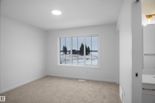 #9 1430 Aster Wy Nw, Edmonton, AB - Indoor Photo Showing Other Room