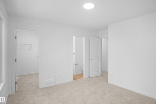 #9 1430 Aster Wy Nw, Edmonton, AB - Indoor Photo Showing Other Room