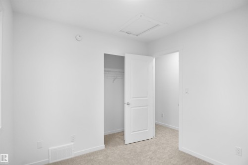 #9 1430 Aster Wy Nw, Edmonton, AB - Indoor Photo Showing Other Room