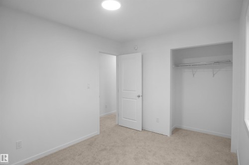 #9 1430 Aster Wy Nw, Edmonton, AB - Indoor Photo Showing Other Room