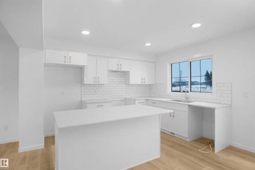 #9 1430 Aster Wy Nw, Edmonton, AB - Indoor Photo Showing Kitchen