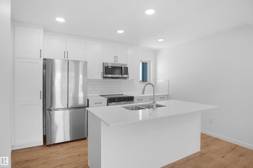 2708 Alces Way Sw, Edmonton, AB - Indoor Photo Showing Kitchen With Double Sink With Upgraded Kitchen