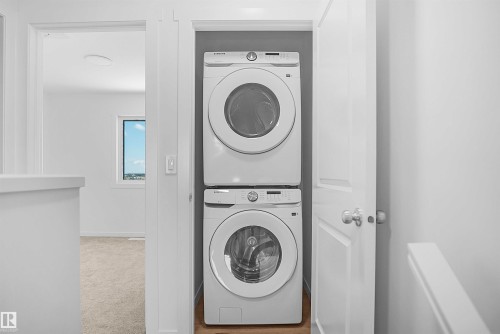 2708 Alces Way Sw, Edmonton, AB - Indoor Photo Showing Laundry Room