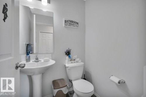 2-piece main floor bathroom - 19303 27 Avenue Nw, Edmonton, AB - Indoor Photo Showing Bathroom