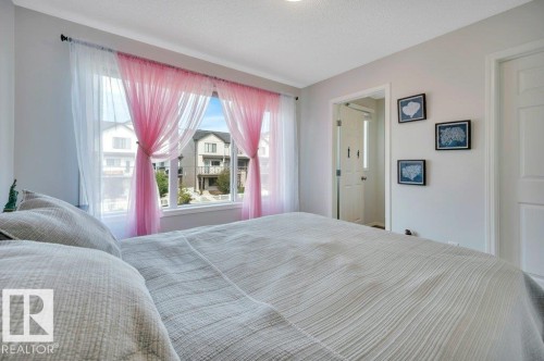 North-facing windows - 19303 27 Avenue Nw, Edmonton, AB - Indoor Photo Showing Bedroom