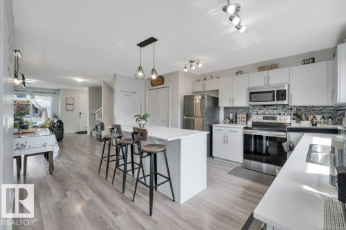 Spacious kitchen with large island - 19303 27 Avenue Nw, Edmonton, AB - Indoor Photo Showing Kitchen With Upgraded Kitchen