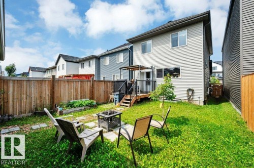 Backyard with deck and fire pit - 19303 27 Avenue Nw, Edmonton, AB - Outdoor