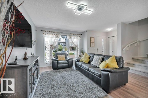 Looking towards front door - 19303 27 Avenue Nw, Edmonton, AB - Indoor Photo Showing Living Room