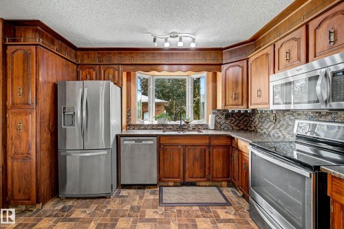 6115 152A Avenue Nw, Edmonton, AB - Indoor Photo Showing Kitchen With Stainless Steel Kitchen