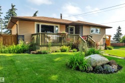 Exterior with horizontal siding and stone accents - 