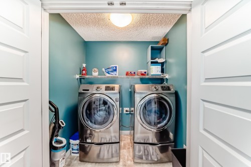 Large Laundry Room on 2nd Floor - 259 Robinson Drive, Leduc, AB - Indoor Photo Showing Laundry Room