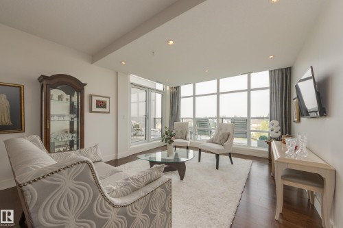 #403 1350 Windermere Wy Sw, Edmonton, AB - Indoor Photo Showing Living Room