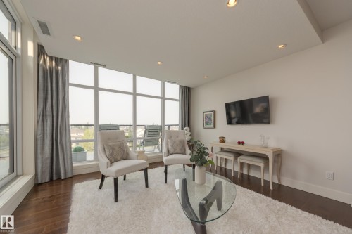 #403 1350 Windermere Wy Sw, Edmonton, AB - Indoor Photo Showing Living Room