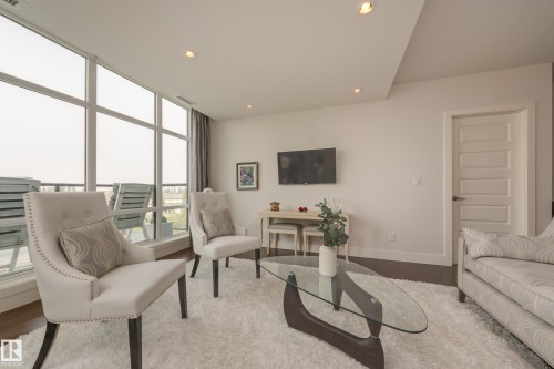 #403 1350 Windermere Wy Sw, Edmonton, AB - Indoor Photo Showing Living Room