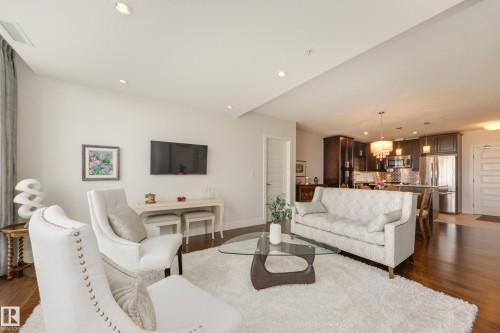 #403 1350 Windermere Wy Sw, Edmonton, AB - Indoor Photo Showing Living Room