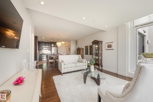 #403 1350 Windermere Wy Sw, Edmonton, AB - Indoor Photo Showing Living Room